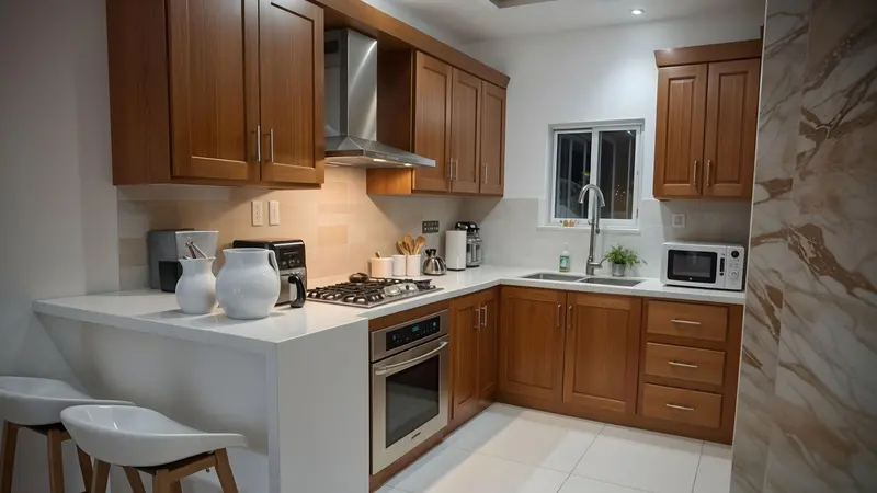 A clean and modern kitchen featuring wooden cabinets and stainless steel appliances.